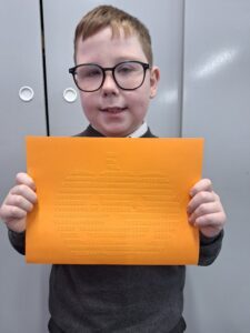 Brady holding the pumpkin